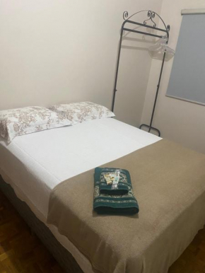 Quarto em ap compartilhado no centro de Concórdia